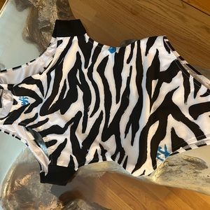 Worn once off white one piece swim boobs were adjusted a little to the side